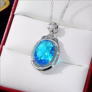 The Cassandra 925 necklace with blue cubic zirconia pendant